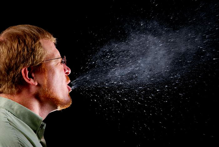 Science Reveals How Far Your Germs Travel Every Time You Sneeze