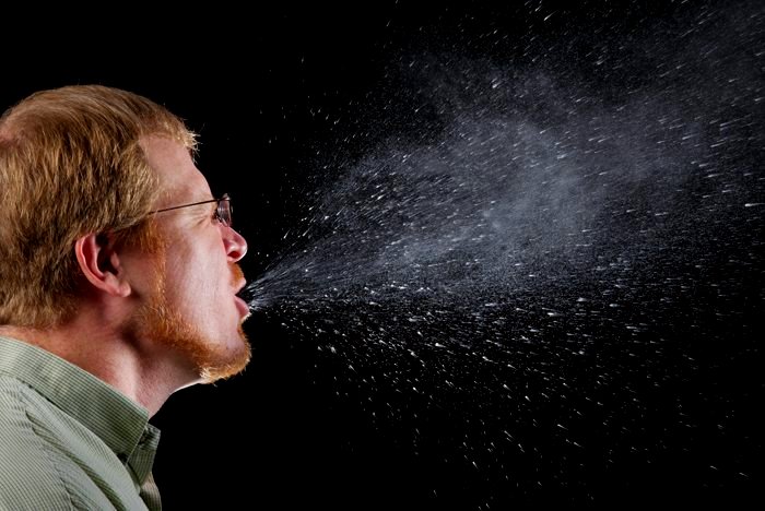 Science Reveals How Far Your Germs Travel Every Time You Sneeze