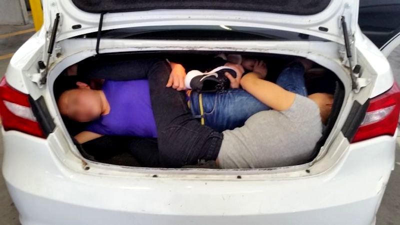 Driver Caught Trying to Smuggle Four Chinese Immigrants to the U.S. in a Trunk