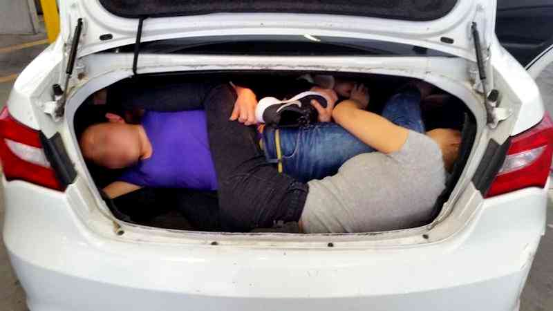 Driver Caught Trying to Smuggle Four Chinese Immigrants to the U.S. in a Trunk