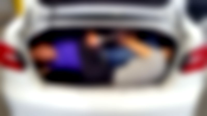 Driver Caught Trying to Smuggle Four Chinese Immigrants to the U.S. in a Trunk
