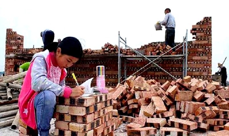 Chinese Girl Who Does Her Homework on A Pile of Bricks Proves the Struggle is Real