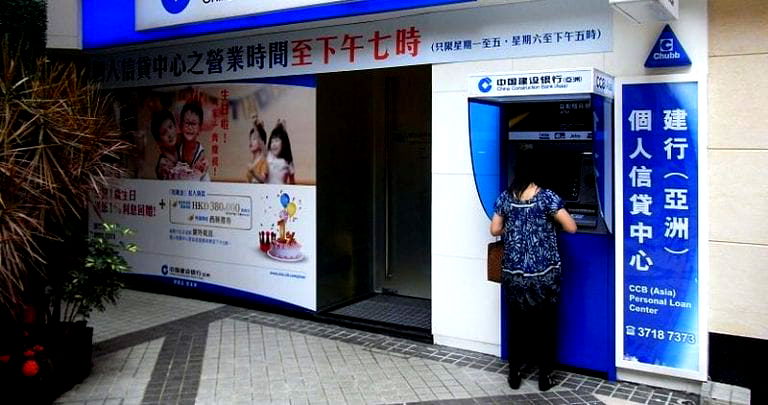 Chinese Woman Tricked into Pouring Soda on ATM to Get Money in Scam
