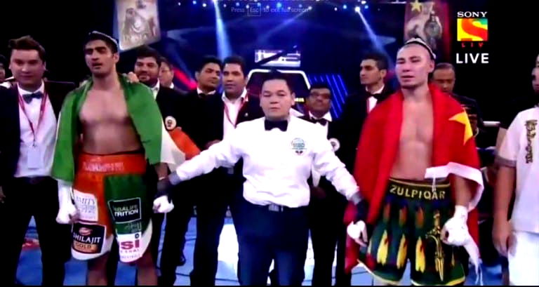 Indian Boxer Offers Championship Belt After Defeating Chinese Opponent As a Peace Offering