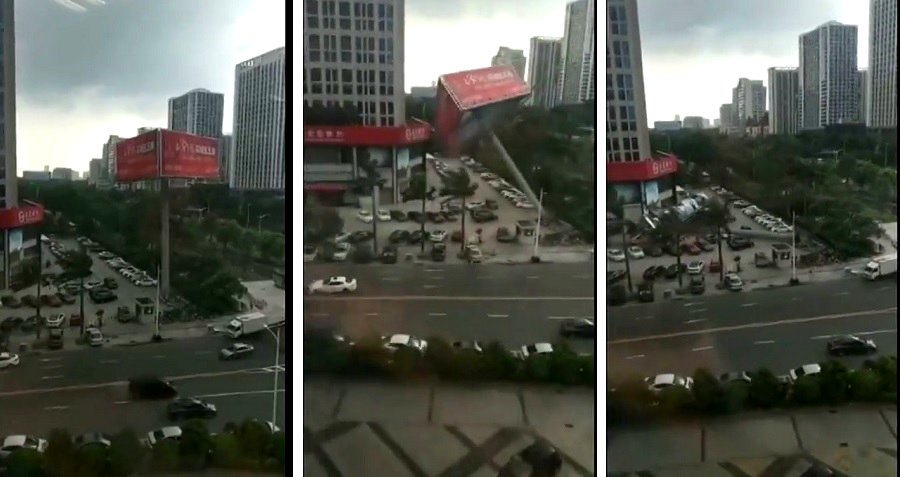 Giant Billboard Crushes Parked Cars in Downtown Dongguan, China