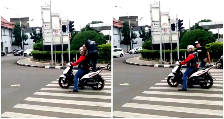 Pedestrian in Indonesia Schools Scooter Driver at Crosswalk in the Most Extra Way Possible