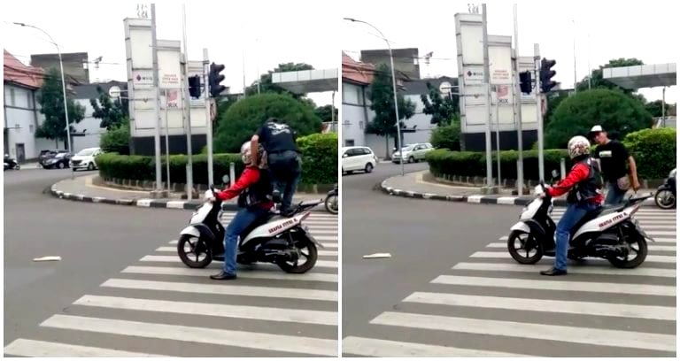 Pedestrian in Indonesia Schools Scooter Driver at Crosswalk in the Most Extra Way Possible
