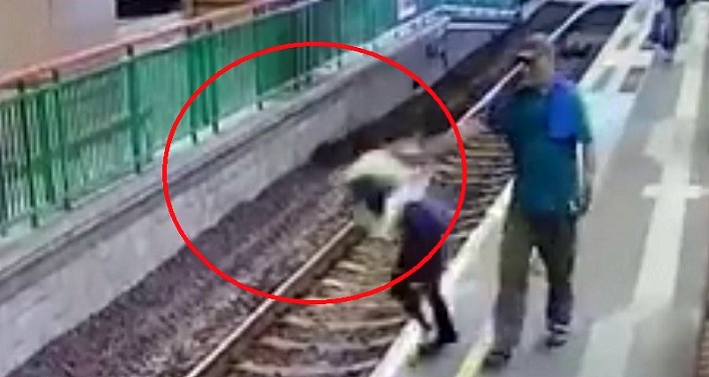 Man Caught Casually Shoving Cleaning Woman onto Train Tracks in Hong Kong