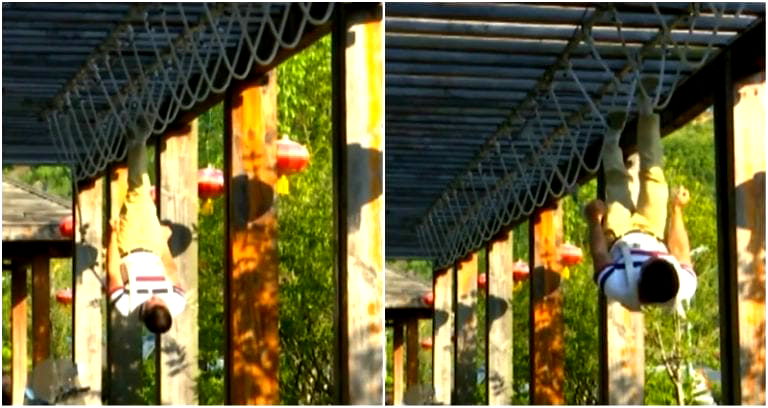 Man Walking Upside Down With Ropes Goes Viral in China