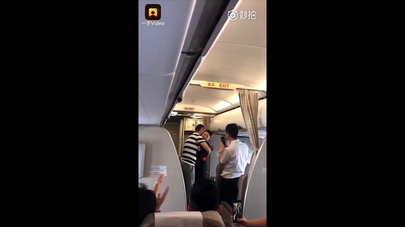 Chinese Flight Attendant Gets Fired After Boyfriend Proposes to Her on ...