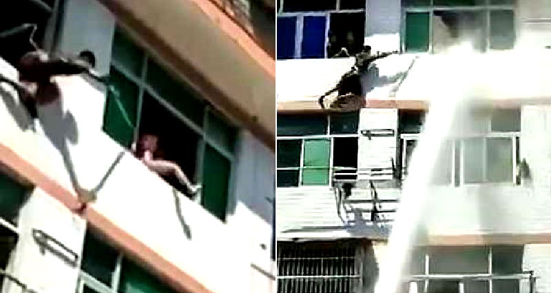 Chinese Firefighters Use Water Hose to Stop Suicidal Woman From Jumping Off Building