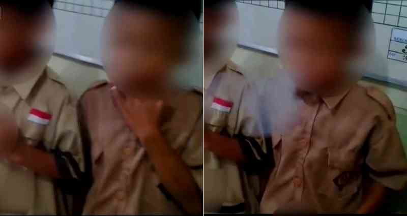 Students Caught S‌m‌okin‌g in Indonesia, Teachers Force Them to S‌m‌ok‌e More as Punis‌‌hm‌ent