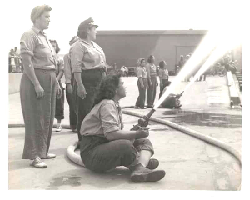 A photograph of four young women purportedly hosing a fire during the Japanese attack on Pearl Harbor has appeared on several mainstream publications and history books as an iconic symbol of determination against adversity.