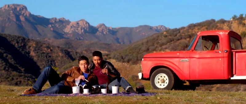 A Filipino-Korean writer, actor and musician from Ohio is the star of a new music video that hilariously weaves gay culture, Asian stereotypes and country music altogether.