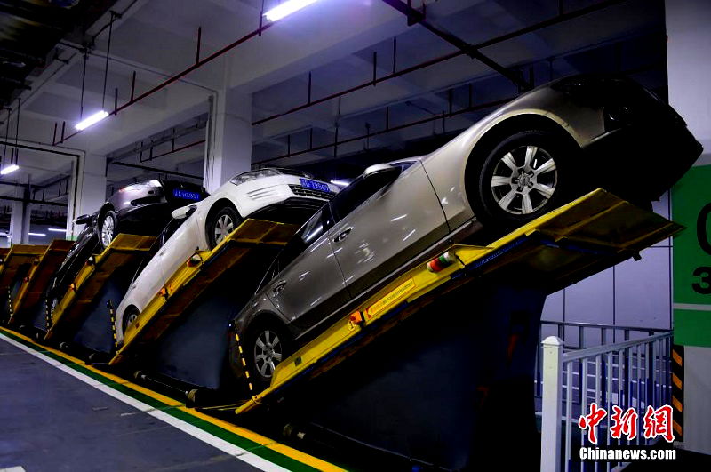 Chongqing, a major city in southwest China, just opened its first inclined parking lot as an experiment to save space for more cars.