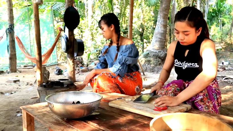 Cambodian YouTubers Casually Prepare Huge Spiders to Eat with Beer