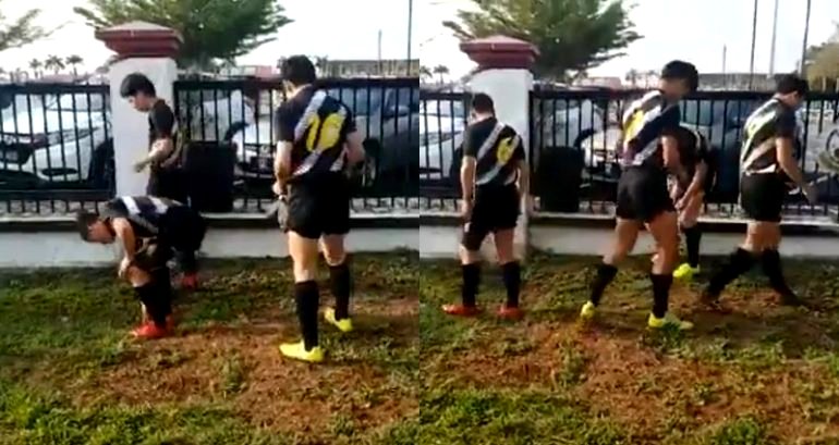 Japanese Rugby Players Clean Up Field After Losing Match in Malaysia