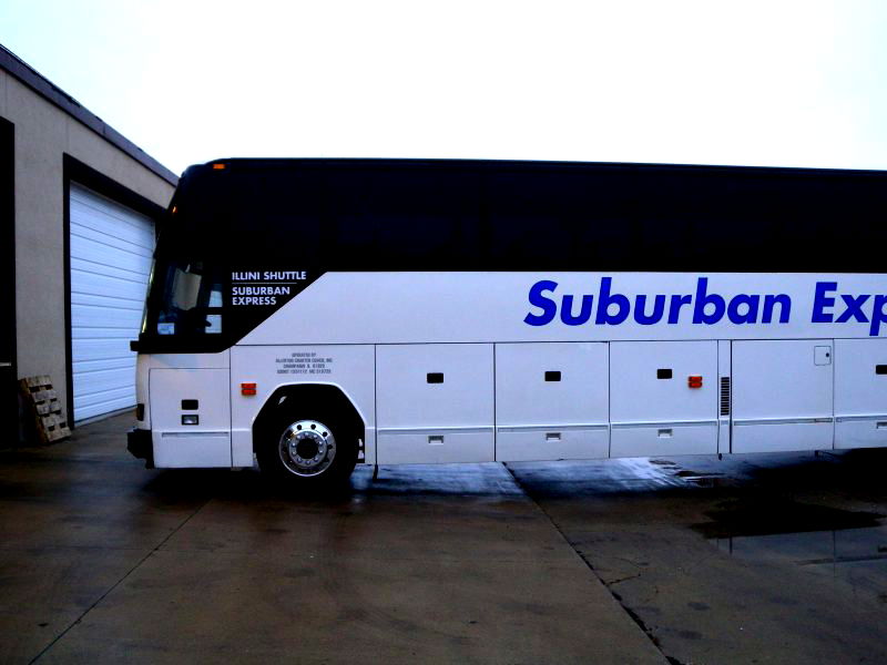 Suburban Express has coughed up a six-figure payment in a legal battle that stemmed from an email advertisement in which they mocked Chinese students.