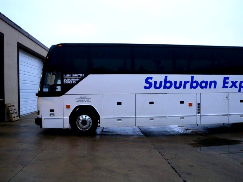 Suburban Express has coughed up a six-figure payment in a legal battle that stemmed from an email advertisement in which they mocked Chinese students.