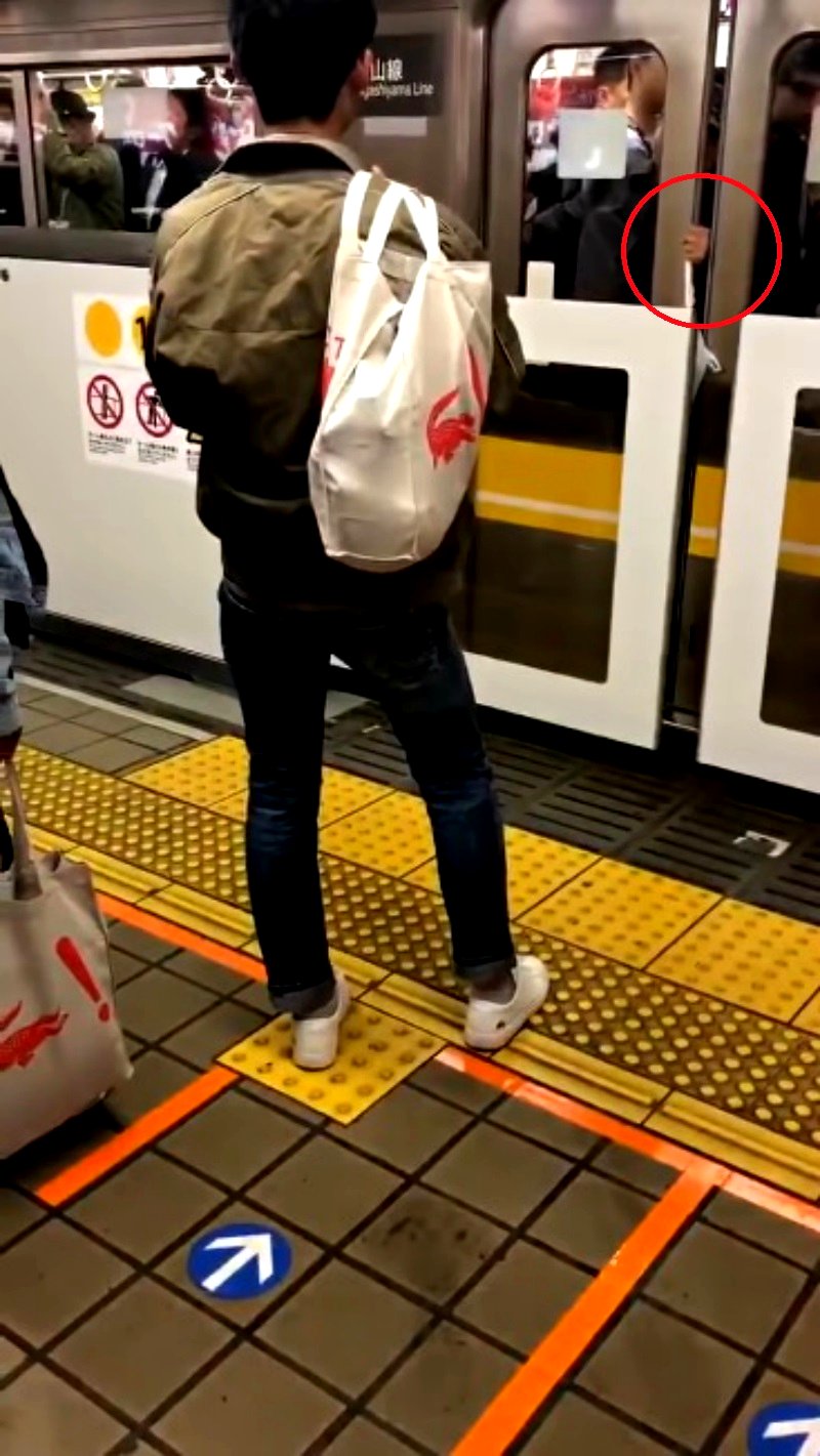 An elderly Japanese commuter who managed to stop a train has gone viral on social media.