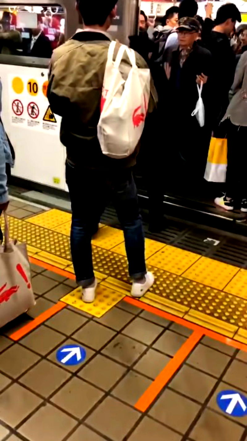 An elderly Japanese commuter who managed to stop a train has gone viral on social media.