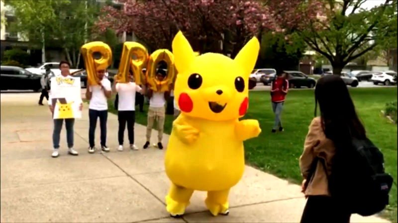 Sometimes simply going up to someone and asking them out to prom isn't extravagant enough which is why this student chose to ask a girl out in public while wearing a massive Pikachu costume.