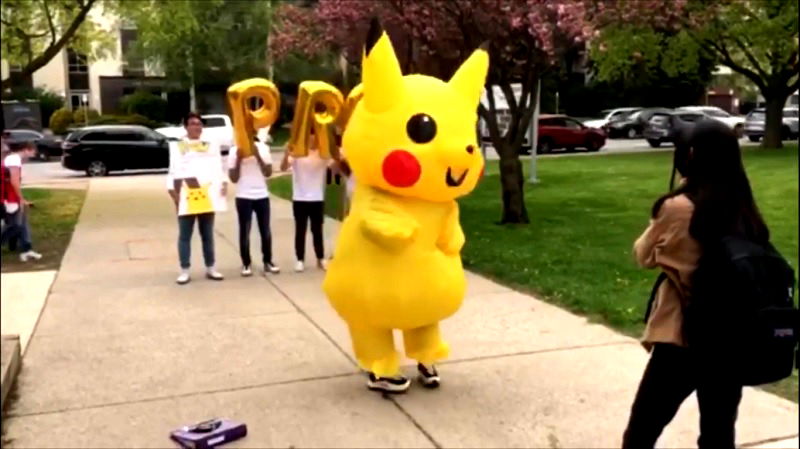 Sometimes simply going up to someone and asking them out to prom isn't extravagant enough which is why this student chose to ask a girl out in public while wearing a massive Pikachu costume.