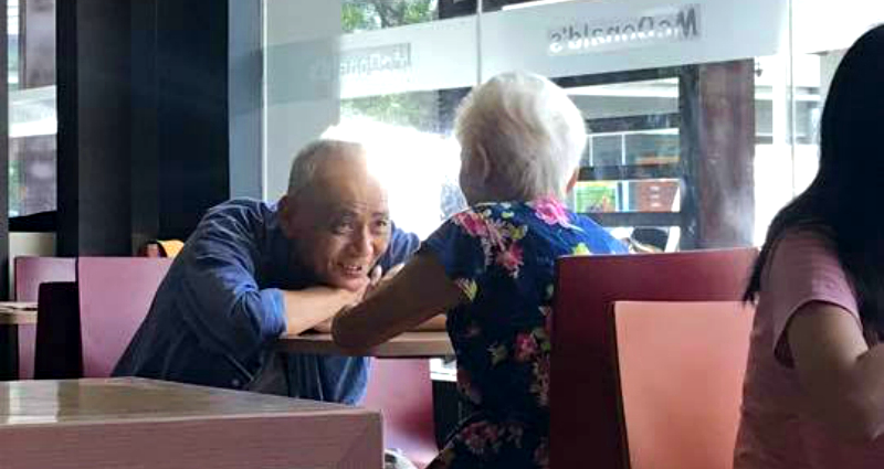 Elderly Man Looking at His ‘Date’ in McDonald’s Sparks Hope That Love Exists