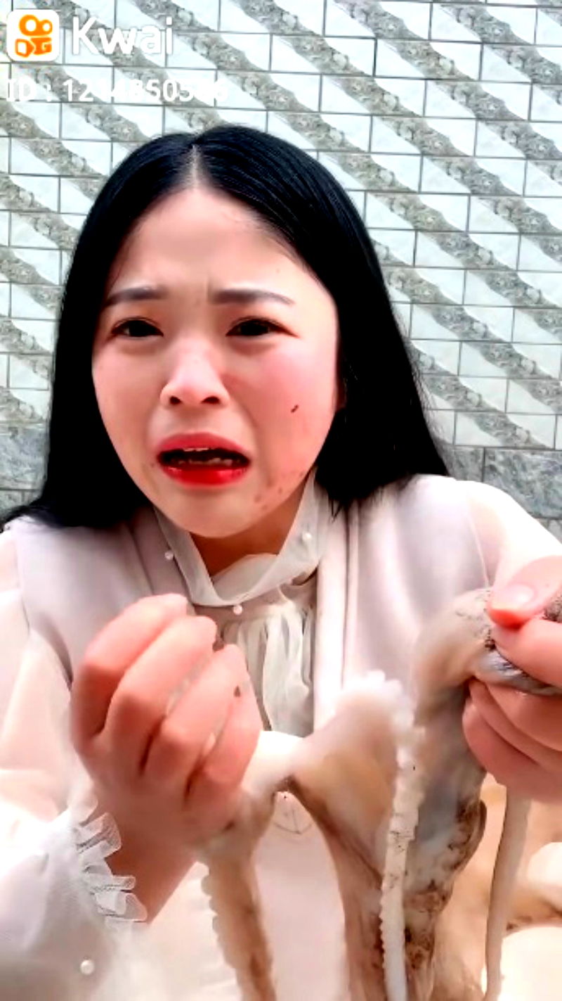 A Chinese livestreamer found her face writhing in pain as an octopus tried to defend itself in her attempts to eat it alive.