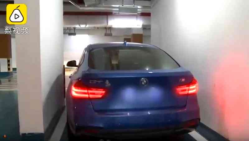 A Chinese woman is taking an apartment developer to court after finding out that the “premium” parking space she purchased won’t let her exit her car unless she passes through the sunroof.