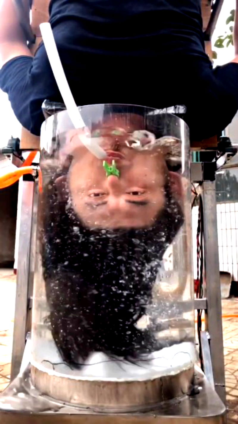 An inventor in China has gone viral on social media after creating a hair washing machine that forces users to go upside down if they actually want to see it work.