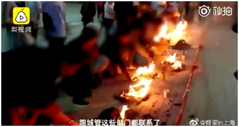 Parents Burn Offerings Outside School to Wish Kids Good Luck on the Gaokao