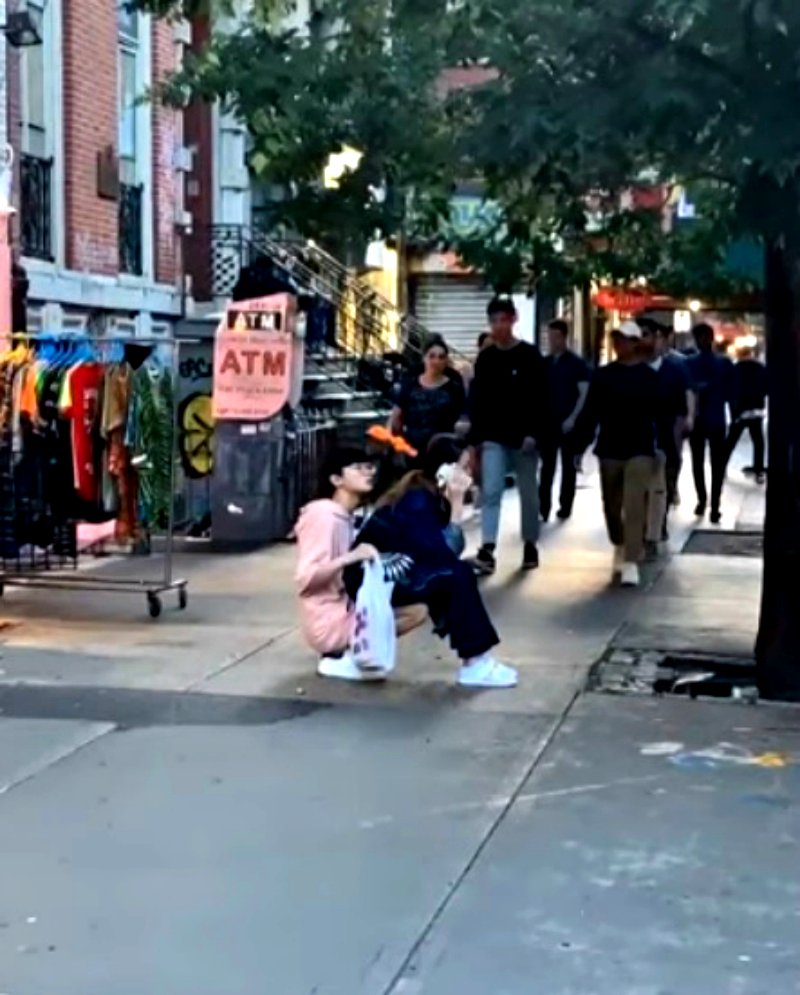 A man who turned himself into a chair for his girlfriend to sit on in public has gone viral on social media.