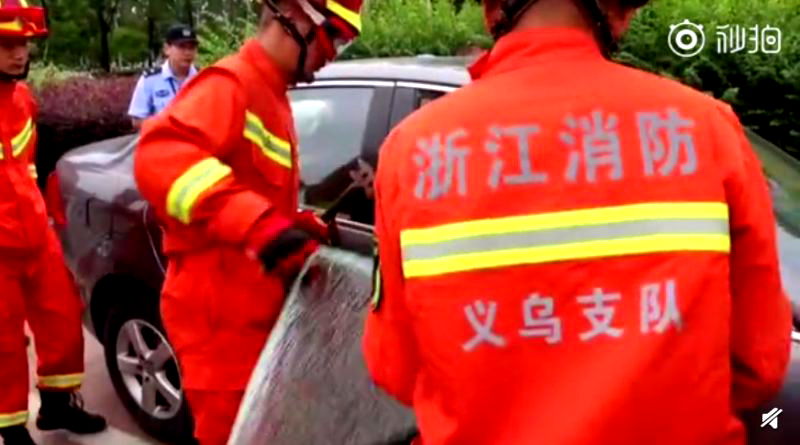 A woman in eastern China is being slammed on social media after trying to stop firefighters from breaking her car window to save her two-year-old son trapped inside the vehicle.