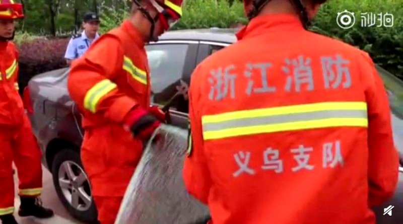 A woman in eastern China is being slammed on social media after trying to stop firefighters from breaking her car window to save her two-year-old son trapped inside the vehicle.