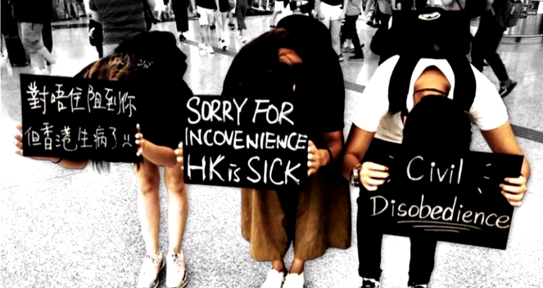 Hong Kong Protesters Apologize to Travelers for Flight Suspensions