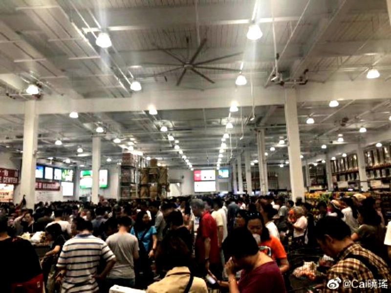 China’s very first Costco outlet opened on Tuesday morning to an insane swarm of shoppers eager to get their hands on bargain goods.