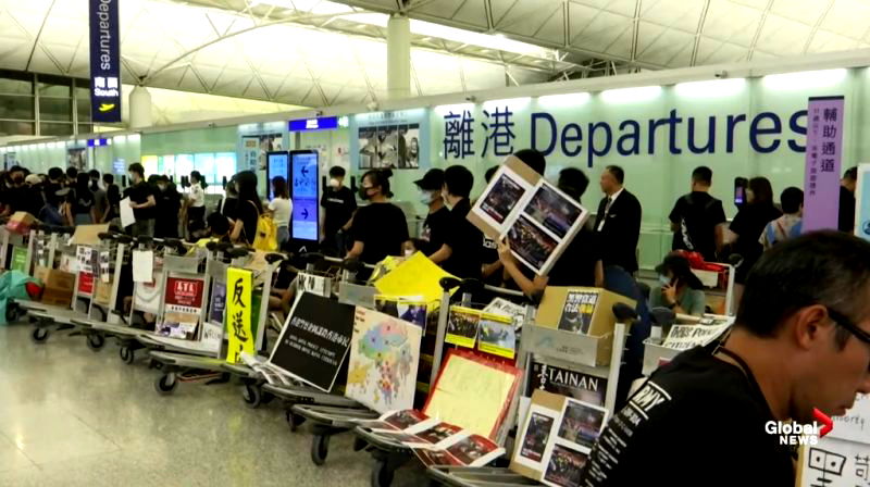 Travelers hoping to leave Hong Kong remained stuck in the city as departure flights were canceled for a second consecutive day amid escalating protests against the government.