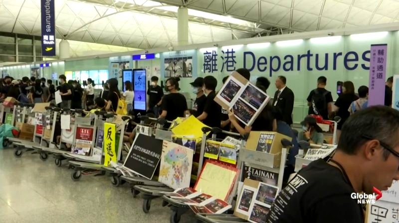 Travelers hoping to leave Hong Kong remained stuck in the city as departure flights were canceled for a second consecutive day amid escalating protests against the government.