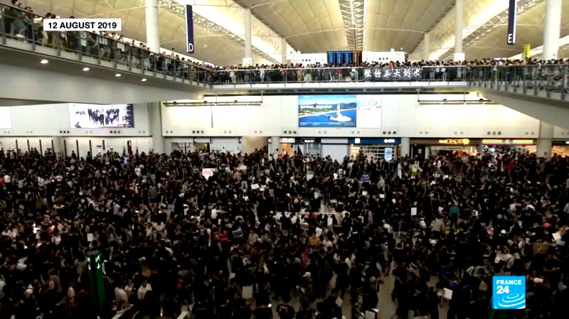 Travelers hoping to leave Hong Kong remained stuck in the city as departure flights were canceled for a second consecutive day amid escalating protests against the government.