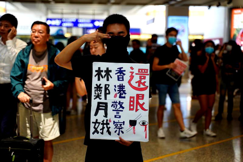 A police officer shot pepper balls point-blank at a group of protesters in Hong Kong over the weekend.