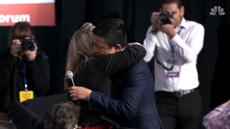 Andrew Yang broke down in tears at a gun laws forum in Iowa on Saturday while addressing a woman who lost her daughter to a stray bullet.