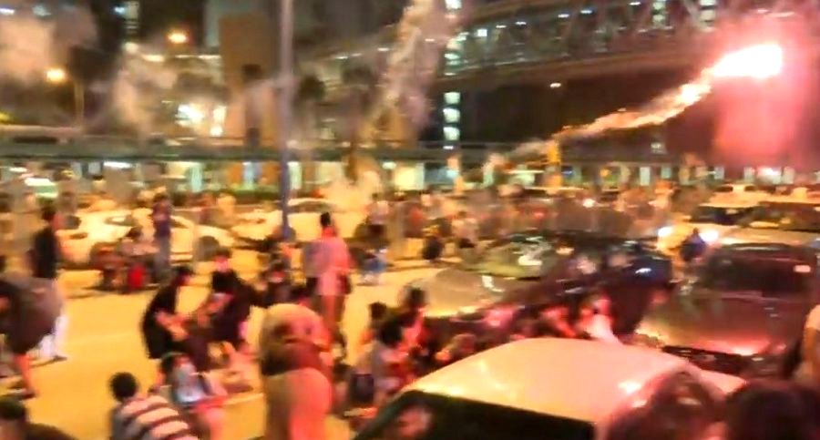 6 Injured After Fireworks are Launched From a Car At Hong Kong Protesters