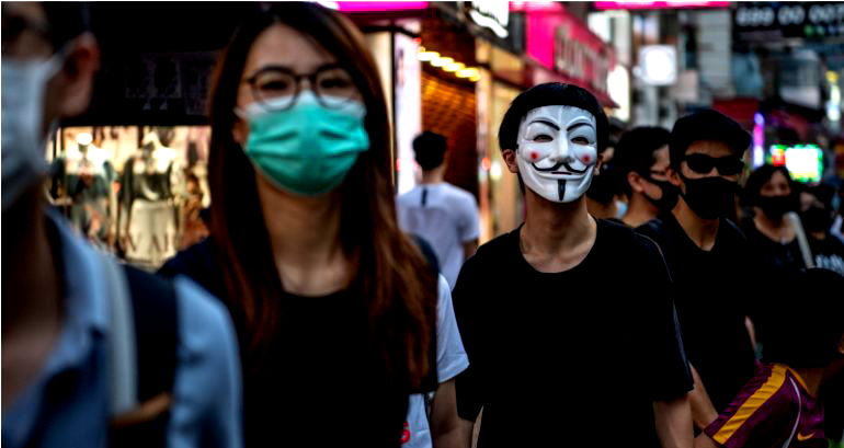 Hong Kong Bans All Masks and Violators Face 1 Year in Jail