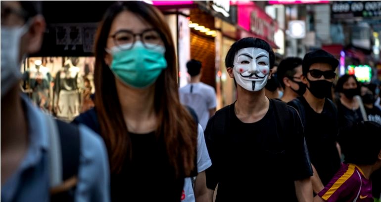 Hong Kong Bans All Masks and Violators Face 1 Year in Jail