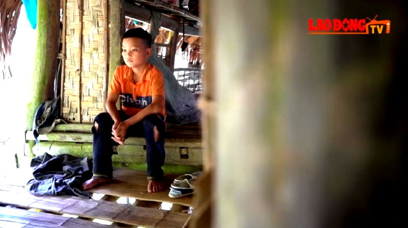 Left to fend for himself after his grandmother and father recently died, 10-year-old Dang Van Khuyen is now farming for his own food.