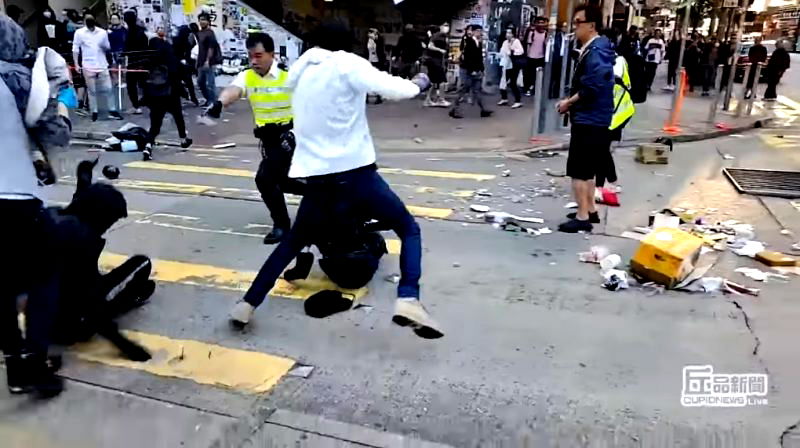 Two protesters have been shot by Hong Kong police during a confrontation in a general strike on Monday.