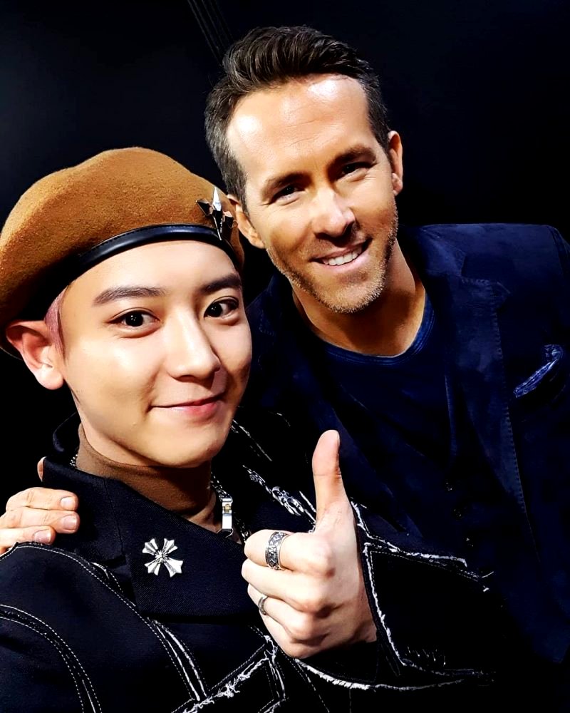 Ryan Reynolds has rubbed elbows with K-Pop group EXO this week.