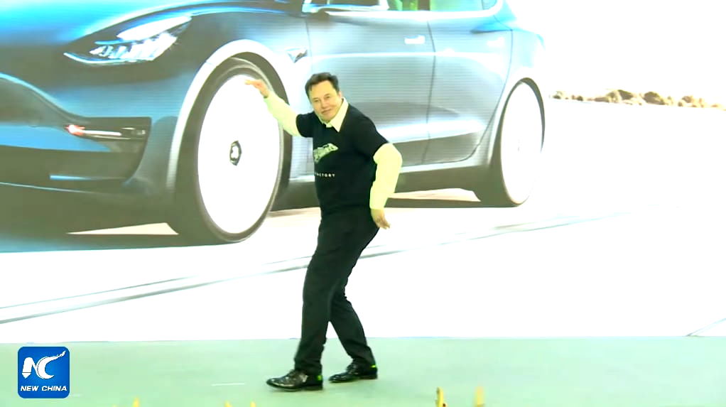 Elon Musk sent a large audience — and later the greater internet — into a frenzy when he tried to pull a John Travolta during a Tesla presentation in Shanghai on Tuesday.