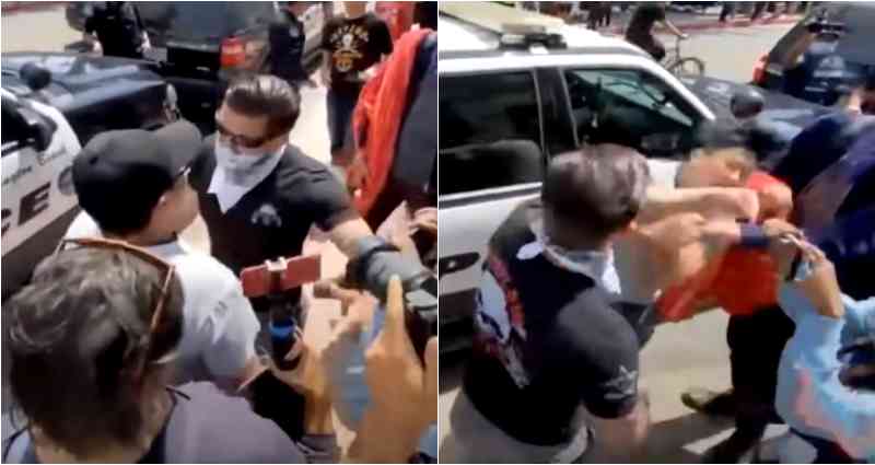 Viral Video Shows Man With Swastika Tattoo Punching Asian Man at White Lives Matter Rally